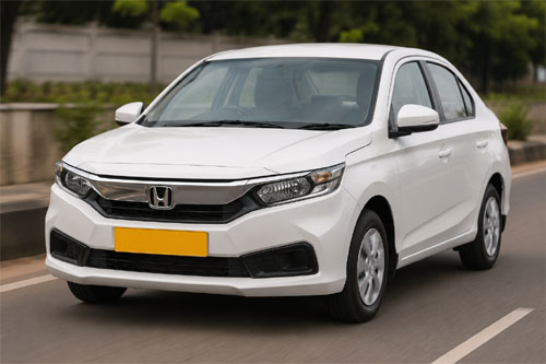 White Honda Amaze taxi with yellow commercial plate